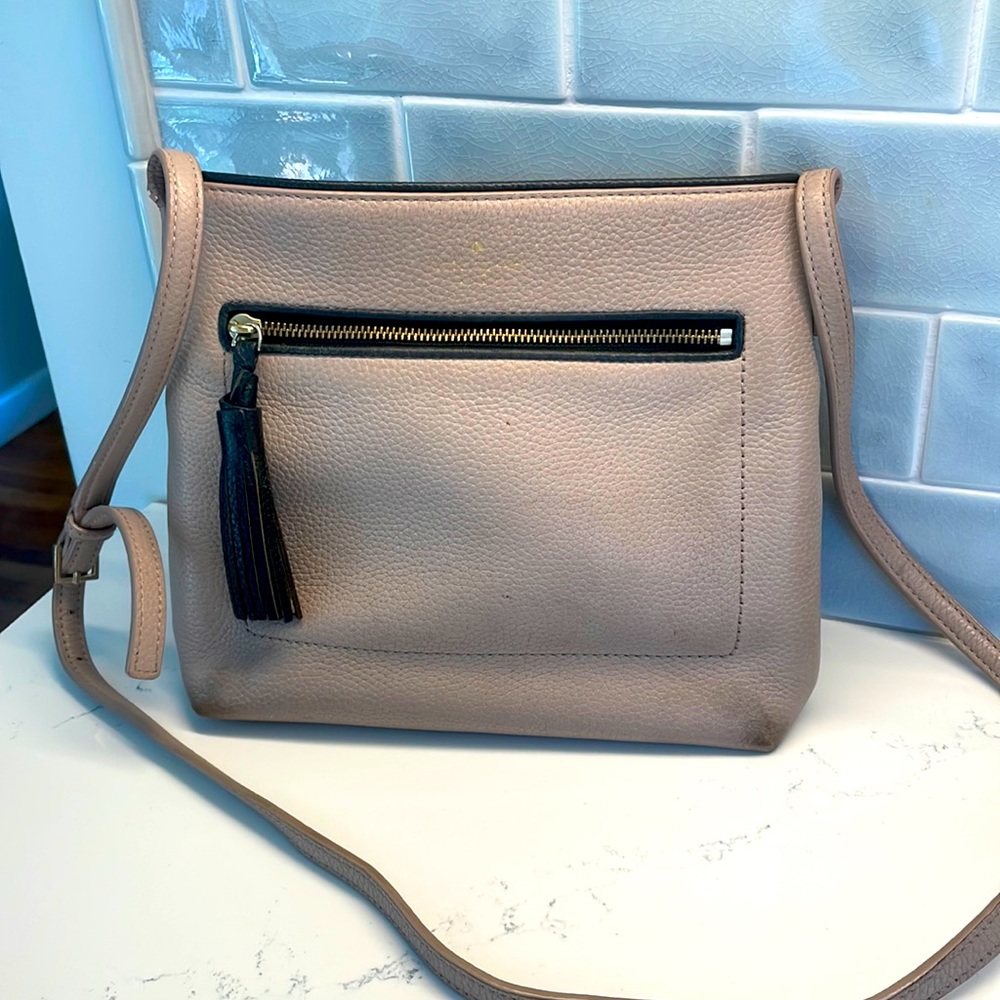 Kate Spade cross body bag in good condition with a few signs of wear.